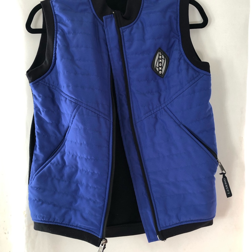Lemond cycling vest.  Women’s xs, front shell, nylon, back, poly fleece.